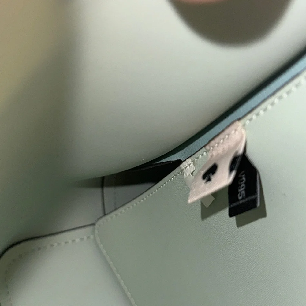 Gorgeous like new med Kate Spade Harper leather tote bag with flower bag charm. - Picture 8 of 10